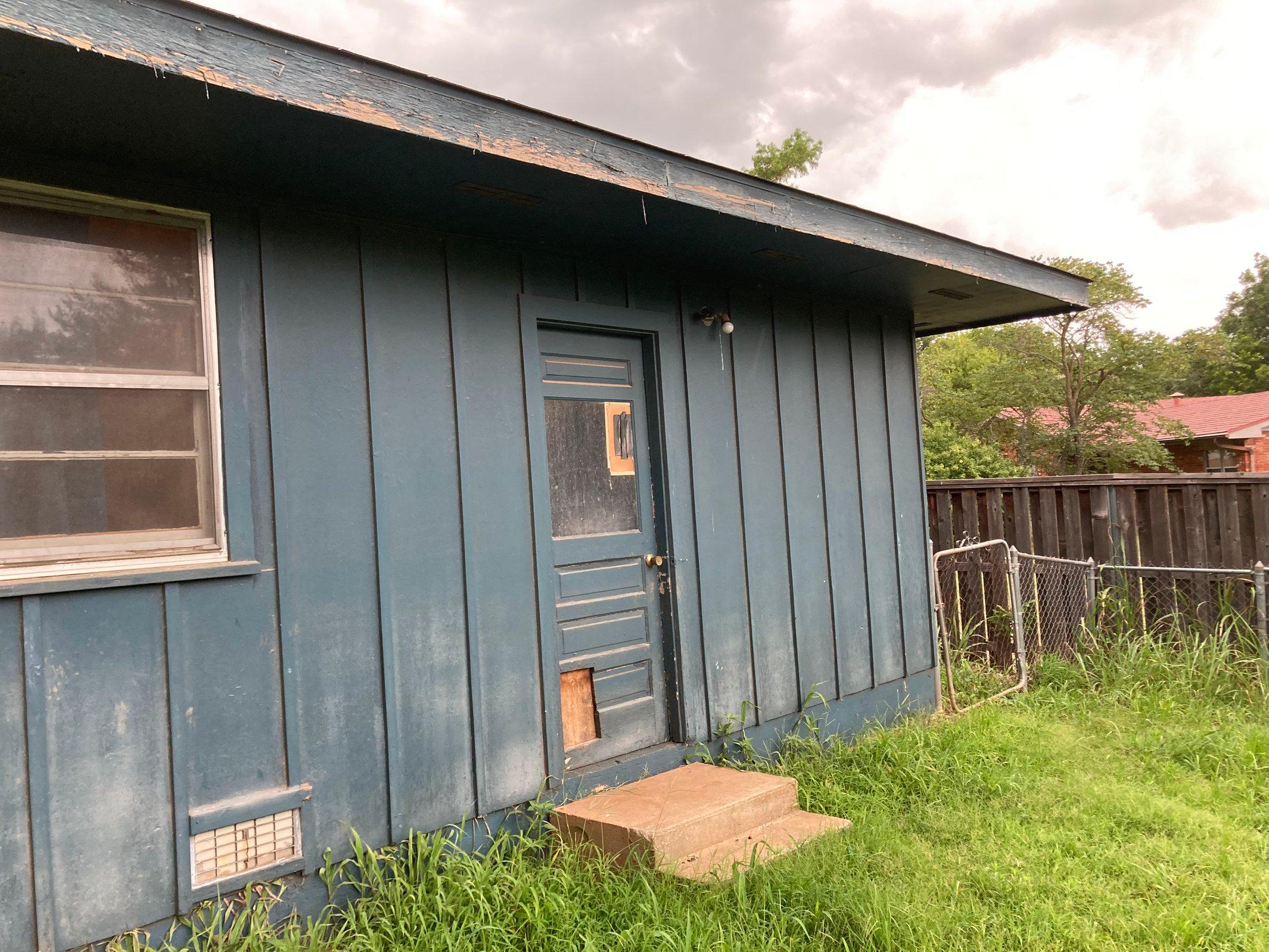 Exterior Siding & Door Repair before
