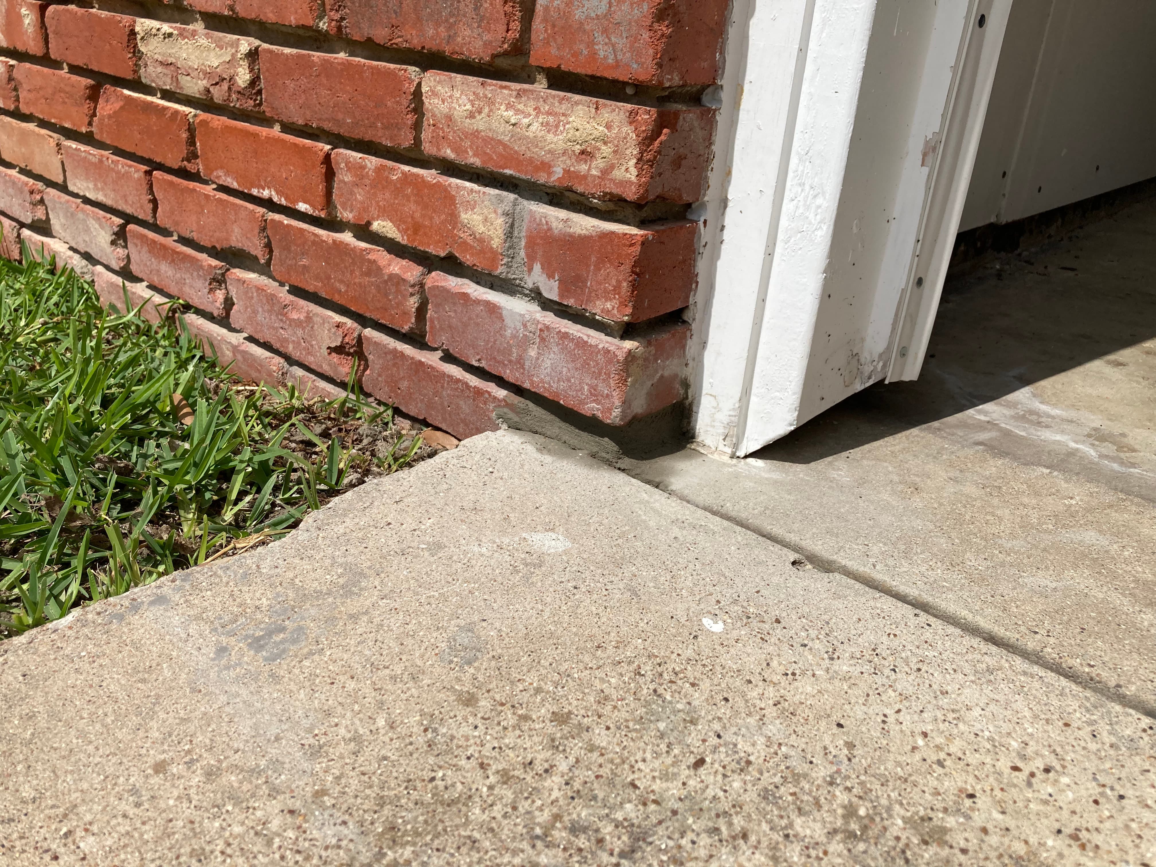 Brick & Mortar Repair at Garage Entry after