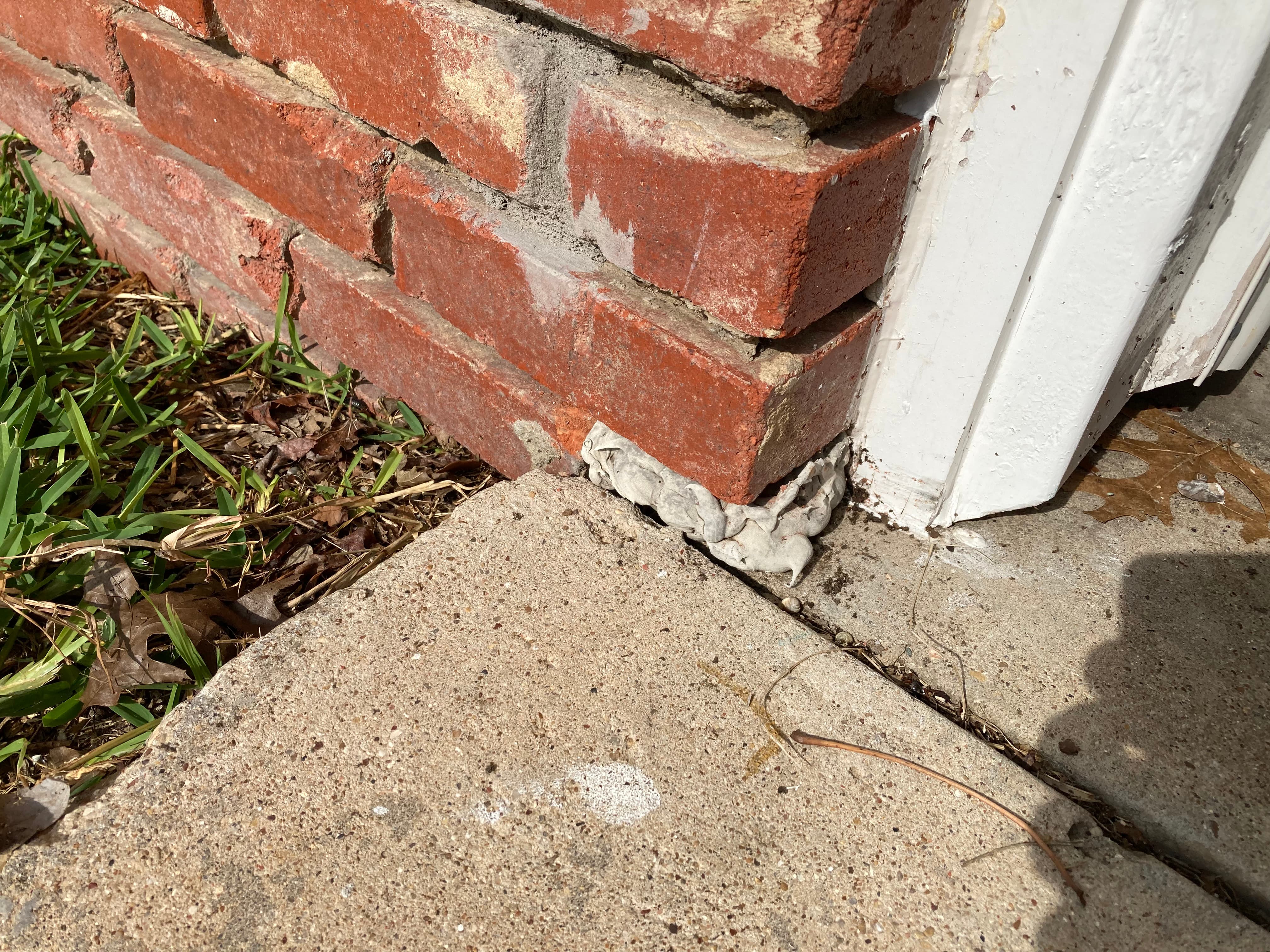 Brick & Mortar Repair at Garage Entry before