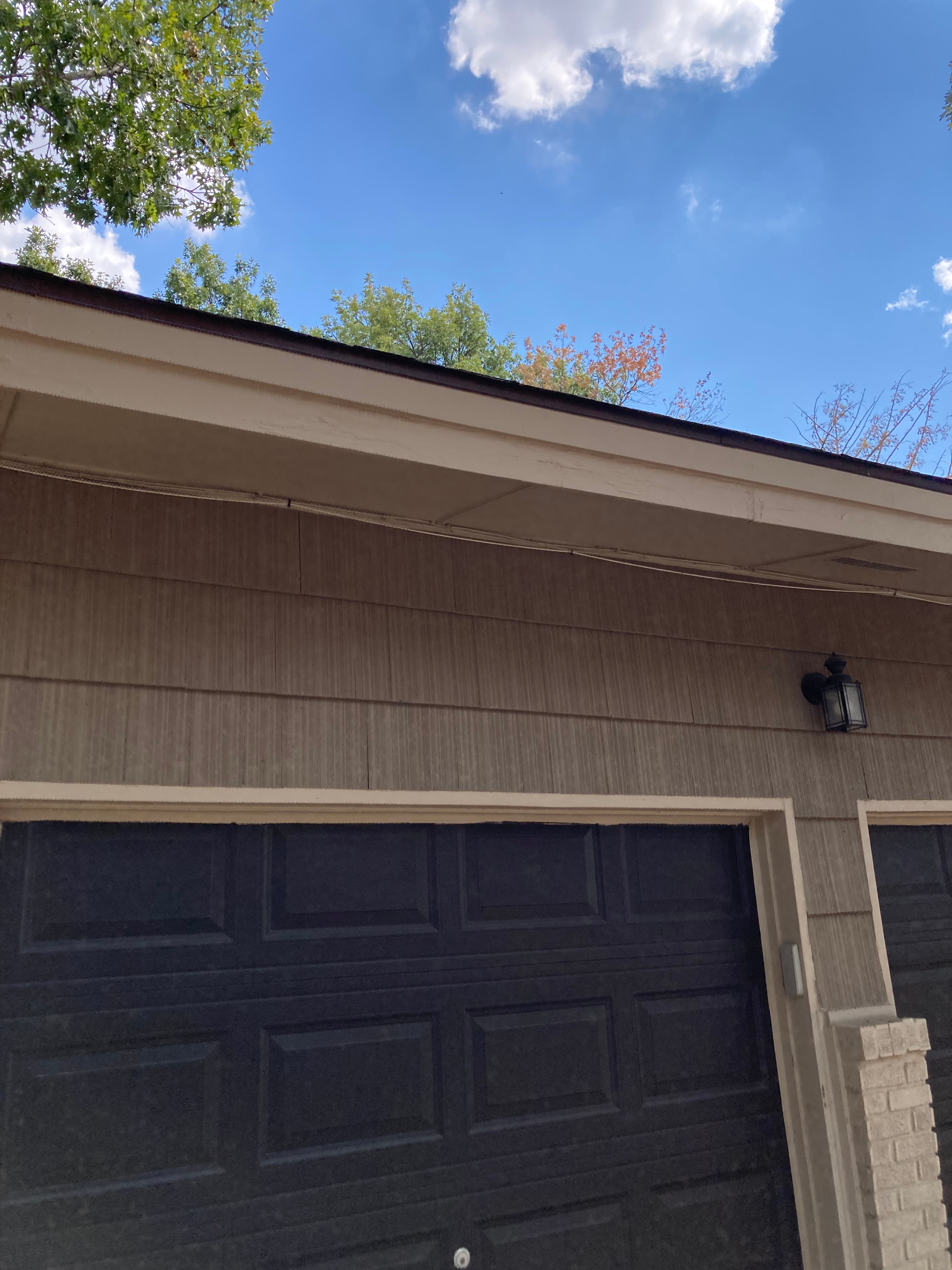Rotten Garage Fascia Repair, Replacement & Painting after
