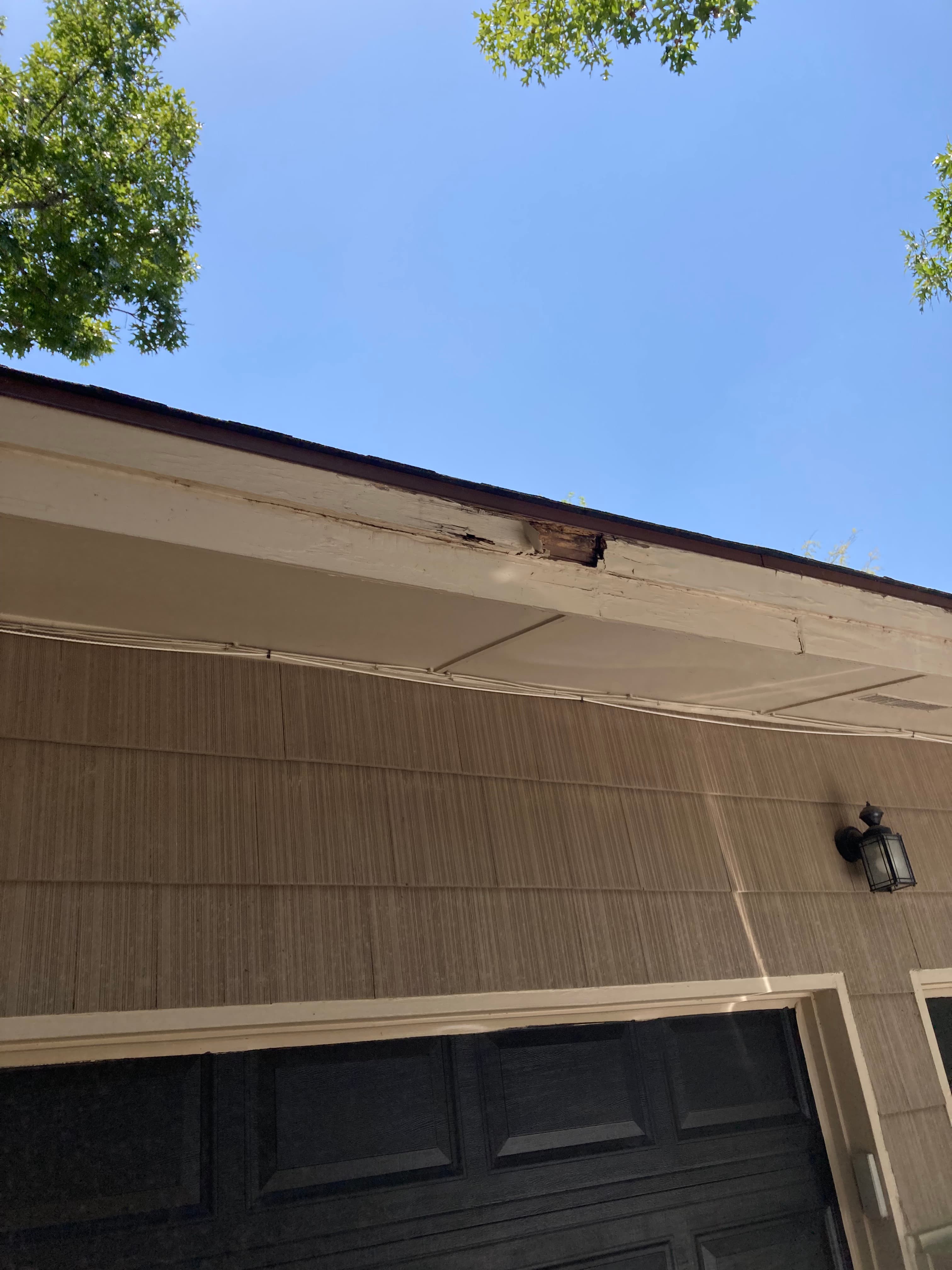 Rotten Garage Fascia Repair, Replacement & Painting before