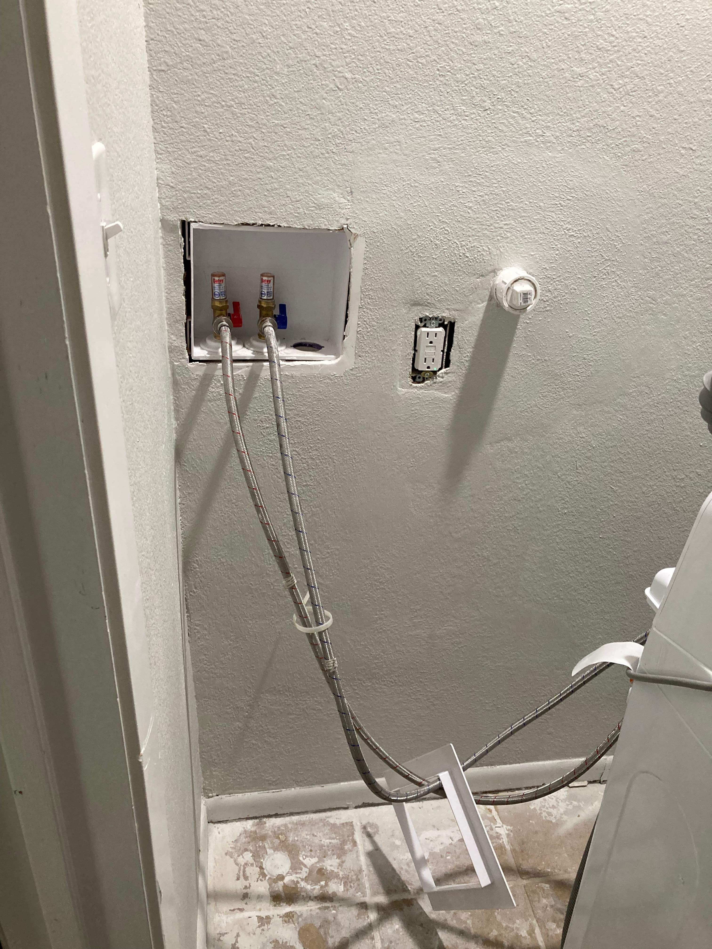 Laundry Room Drywall Repair After Plumbing Work after